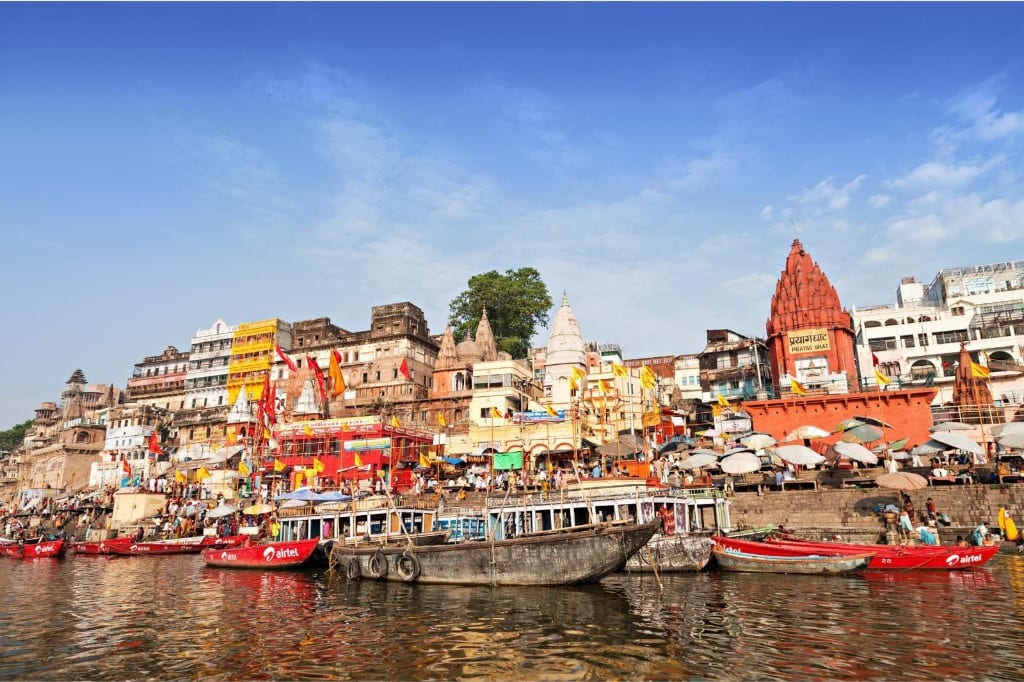Prayag Ghat historic red temple and heritage boats