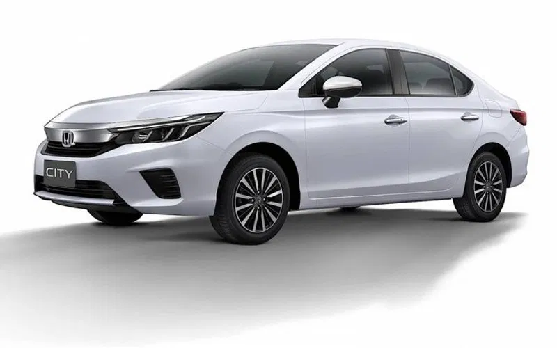 Honda City luxury white sedan exterior Varanasi taxi