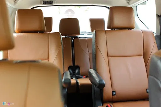 Innova Crysta premium interior cabin showing leather captain seats