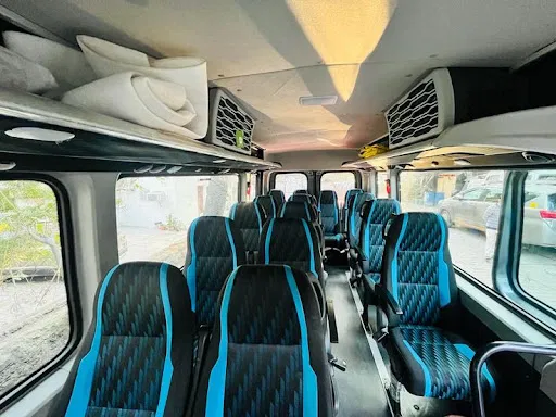 Force Urbania luxury van interior showing executive recliner captain seats and ambient roof lights